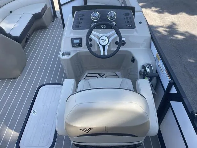 Slide: The Image of 2023 Viaggio L22Q boat cockpit with steering wheel and control panel. - 10