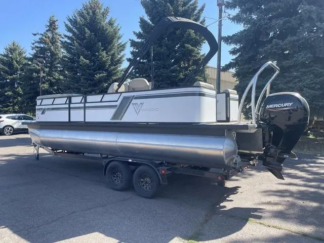 Slide: The Image of 2023 Viaggio L22Q pontoon boat on trailer with Mercury outboard motor. - 3