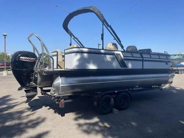 Slide: The Image of 2023 Viaggio L22Q pontoon boat with Mercury outboard motor on trailer. - 5