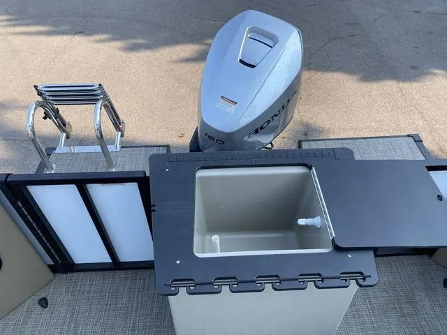 Slide: The Image of 2023 Viaggio LAGO 22F boat with Honda outboard motor and built-in sink. - 12