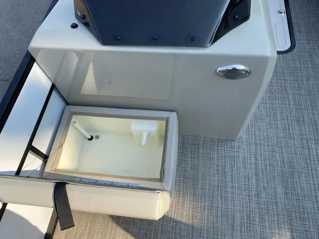 Slide: The Image of Viaggio LAGO 22F 2023 boat interior with storage compartment and seating. - 8