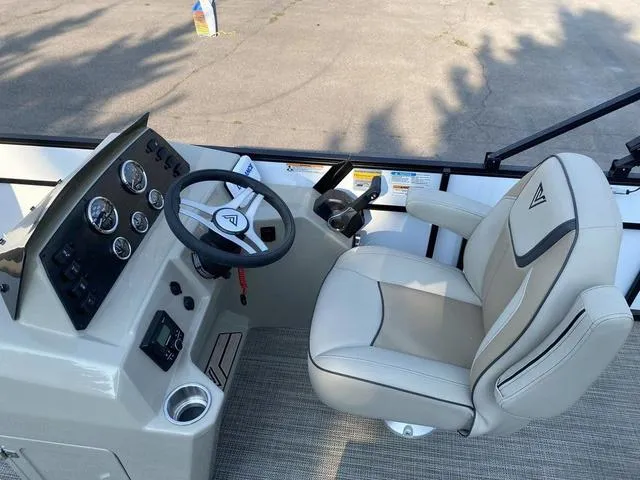 Slide: The Image of Captain's seat and control panel of 2023 Viaggio LAGO 22F boat. - 9