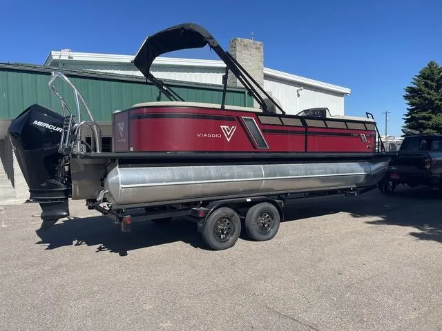 Slide: The Image of 2023 Viaggio L22T pontoon boat on a trailer, red and black design. - 4