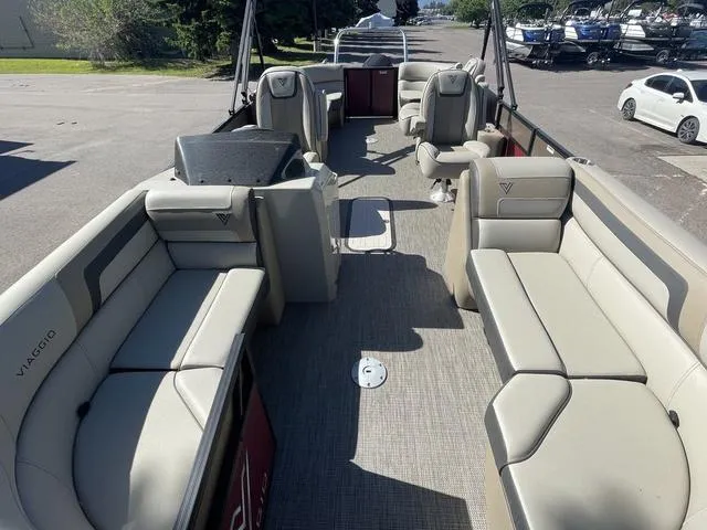 Slide: The Image of 2023 Viaggio L22T pontoon boat with spacious seating and modern design. - 7