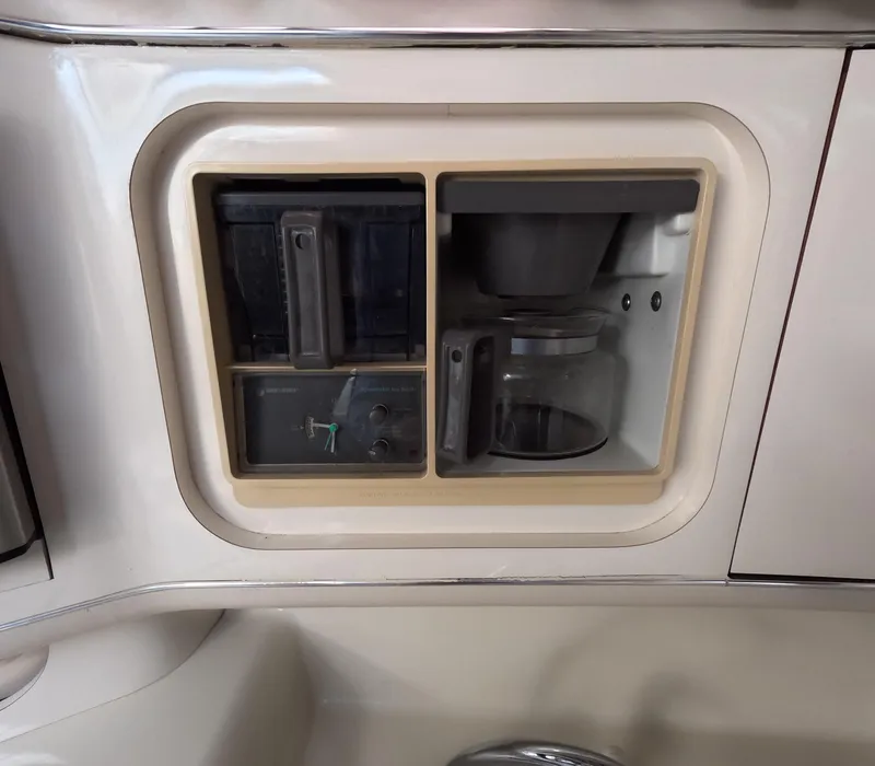 Slide: The Image of Built-in coffee maker on 1995 Sea Ray 370 Sundancer yacht. - 31