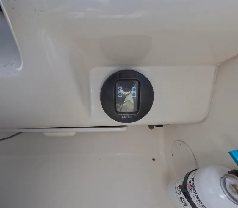 Slide: The Image of Clarion audio control panel on 1995 Sea Ray 370 Sundancer boat. - 41