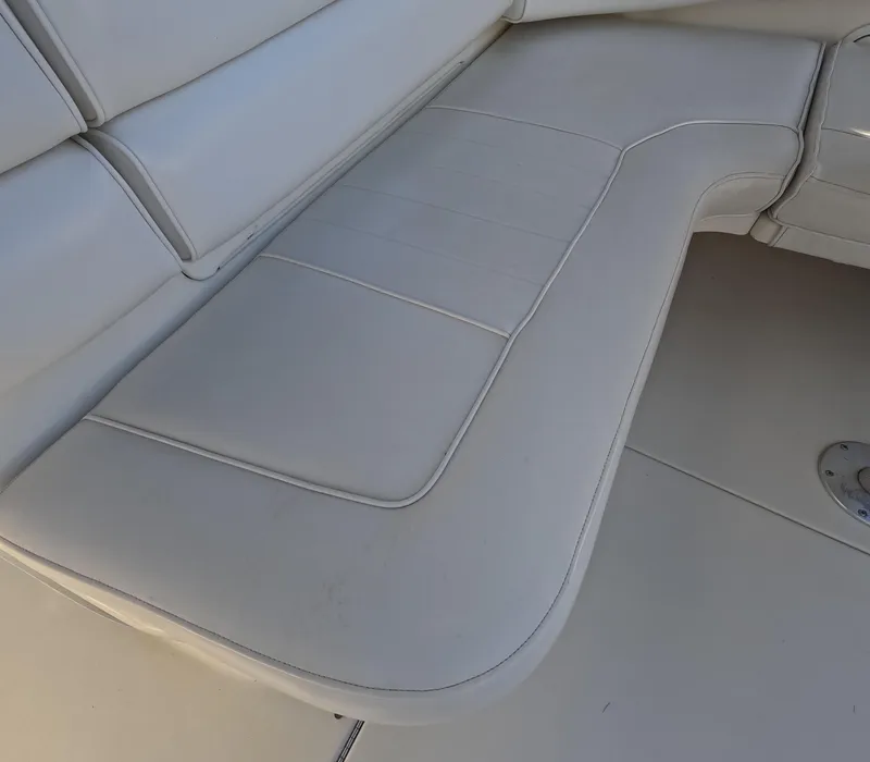 Slide: The Image of 1995 Sea Ray 370 Sundancer white leather seating area - 49