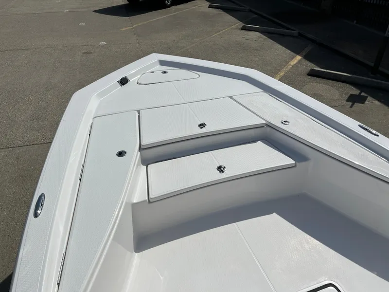 Slide: The Image of 2023 Blue Wave 2200 STL boat bow with storage compartments. - 8