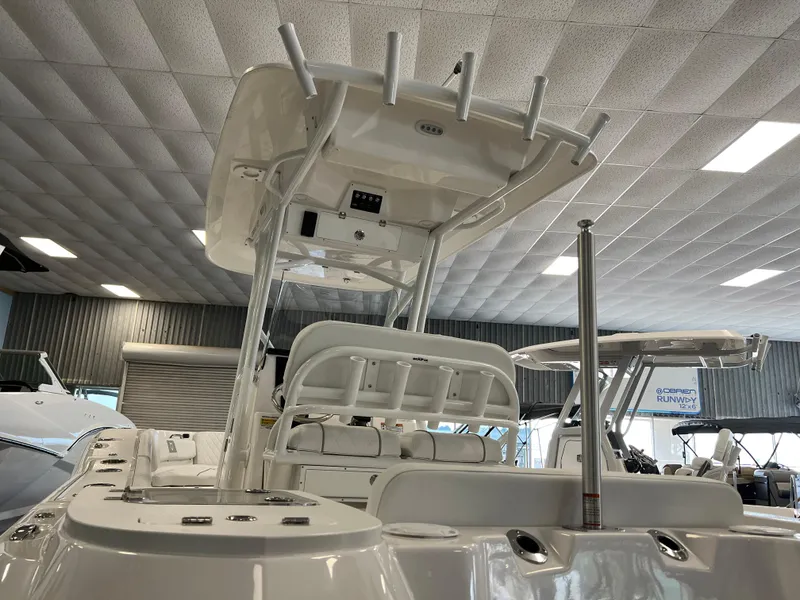 Slide: The Image of 2024 Sea Fox 228 Commander boat interior with T-top and seating. - 6