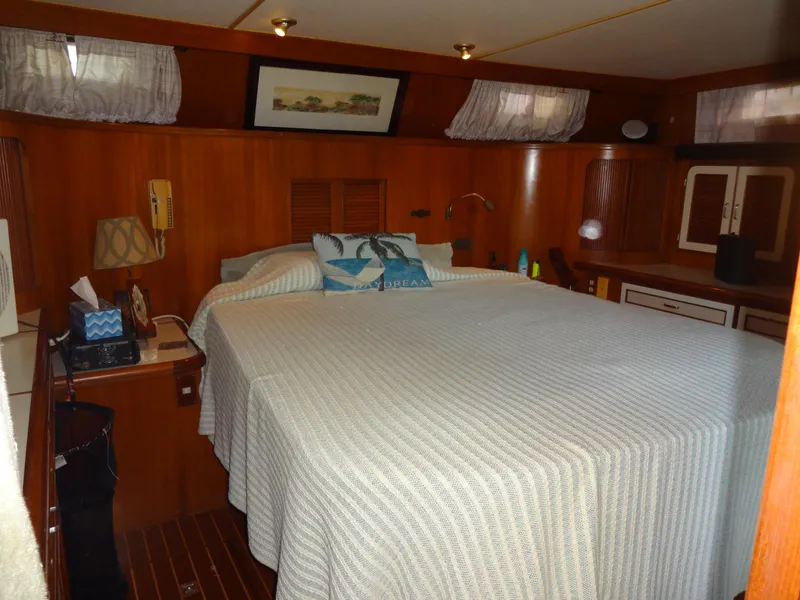 Slide: The Image of Cozy bedroom in 1989 Hi-Star AFT Cabin Sundeck Motor Yacht with wood paneling and decor. - 47