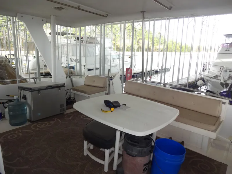 Slide: The Image of 1989 Hi-Star AFT Cabin Sundeck Motor Yacht interior with seating and table. - 7