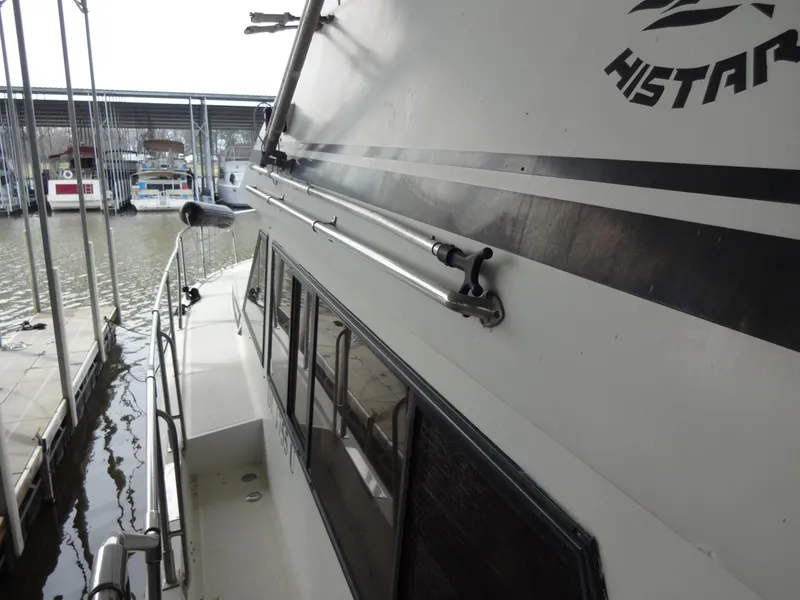 Slide: The Image of 1989 Hi-Star AFT Cabin Sundeck Motor Yacht docked at marina. - 8