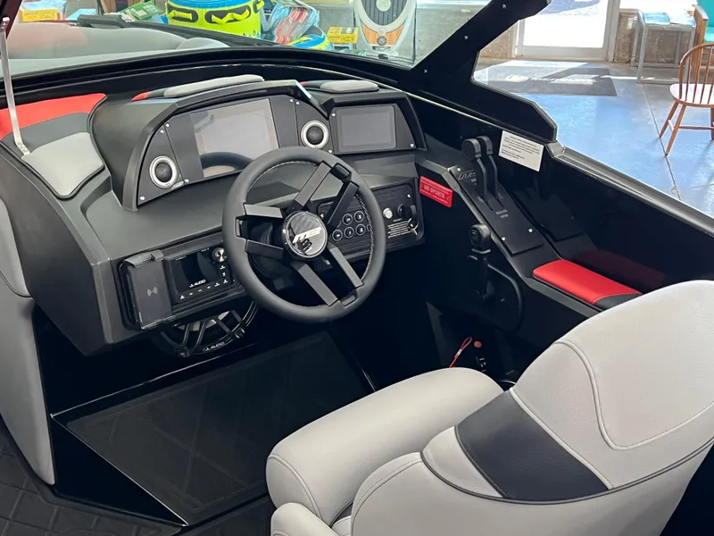 Slide: The Image of 2024 MB B52 boat interior with modern dashboard and steering wheel. - 10