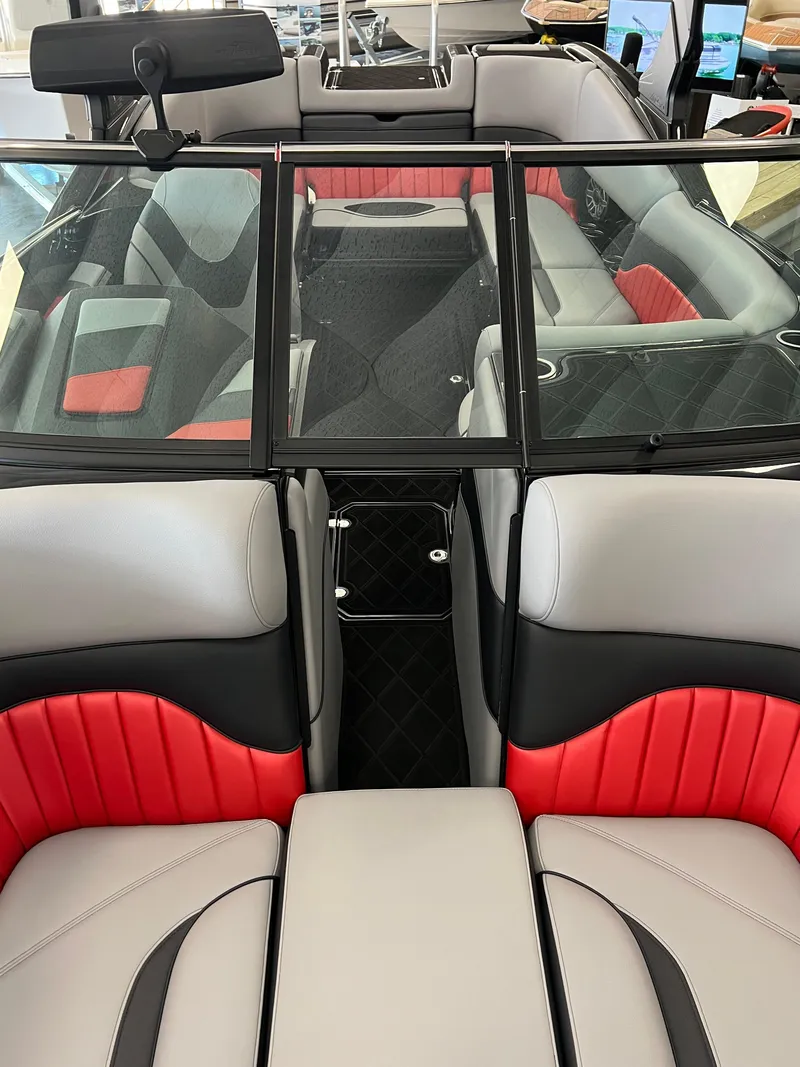 Slide: The Image of 2024 MB B52 boat interior with red and gray seating, modern design. - 9