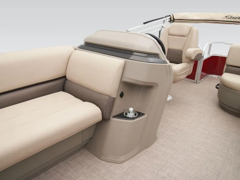 Slide: The Image of 2024 Sun Tracker PARTY BARGE® 18 DLX interior with beige seating and helm. - 7