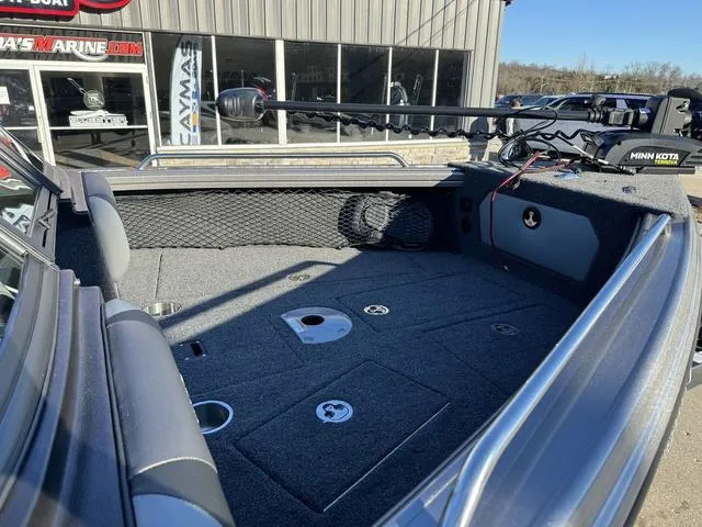 Slide: The Image of 2024 Lund 1975 Tyee Sport boat interior with Minn Kota trolling motor. - 5