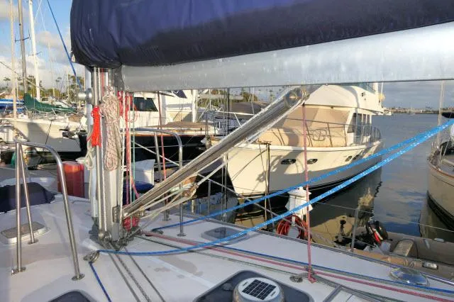 Slide: The Image of Catalina 380 sailboat deck with rigging, docked in marina, 1997 model. - 34