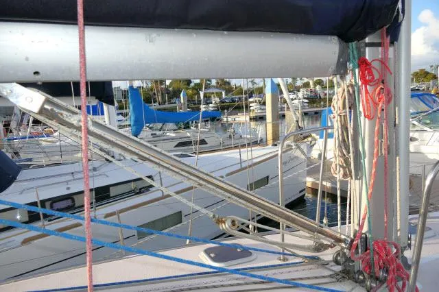 Slide: The Image of Catalina 380 sailboat, 1997 model, docked in a marina with other boats. - 35