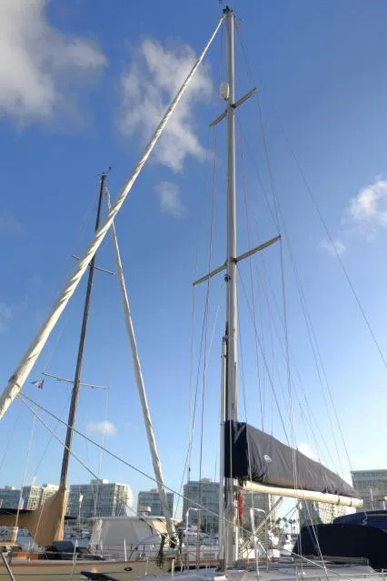 Slide: The Image of Catalina 380 sailboat, 1997 model, docked under a clear blue sky. - 43