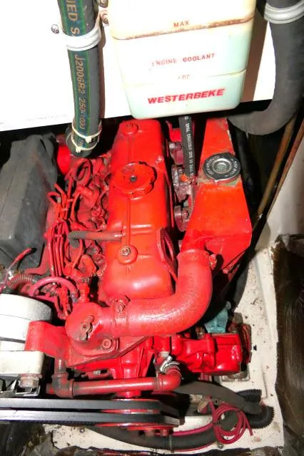 Slide: The Image of Red Westerbeke engine in a 1997 Catalina 380 sailboat. - 44