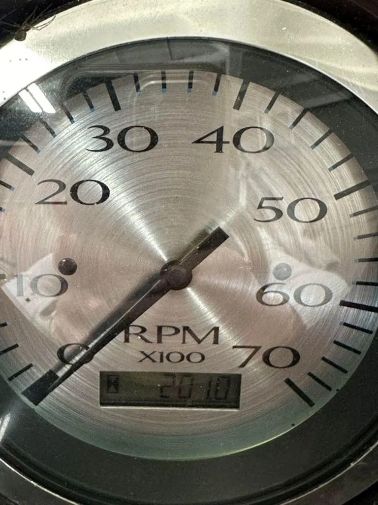 Slide: The Image of Close-up of 2016 Bennington 24 SLX boat tachometer showing RPM. - 14