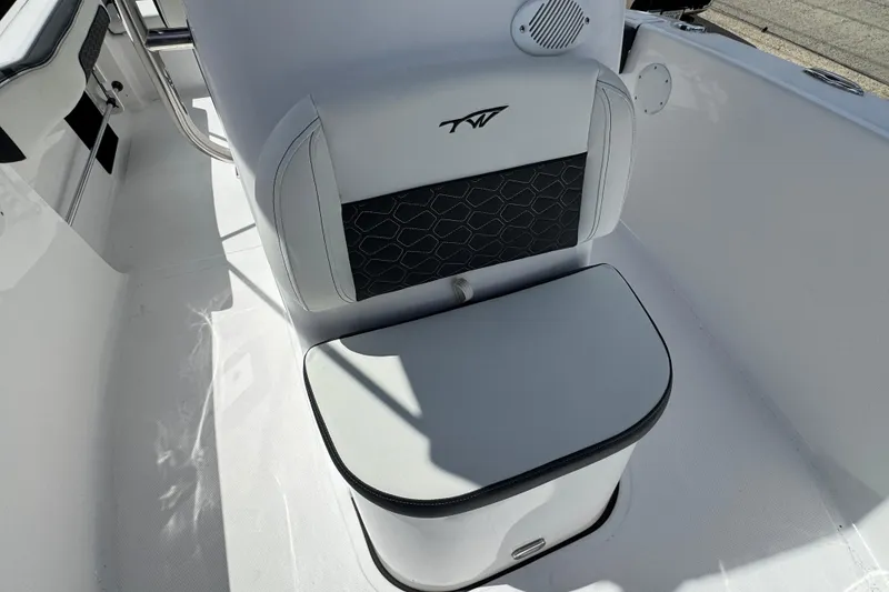 Slide: The Image of 2024 Tidewater 180 CC boat seat with black and white upholstery design. - 14