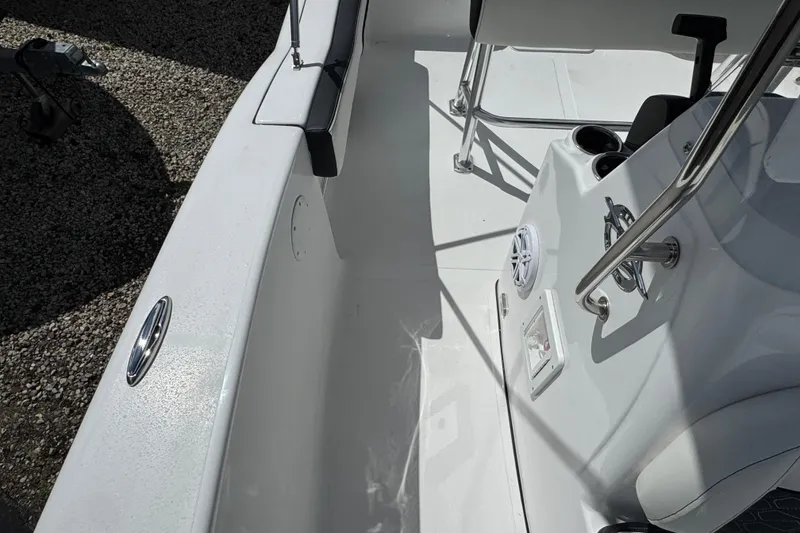 Slide: The Image of 2024 Tidewater 180 CC boat interior with console and seating details. - 24