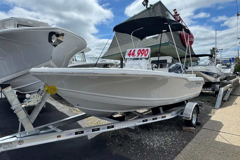 The Image of 2024 Tidewater 180 CC boat on trailer, priced at $44,990, displayed outdoors. - 3