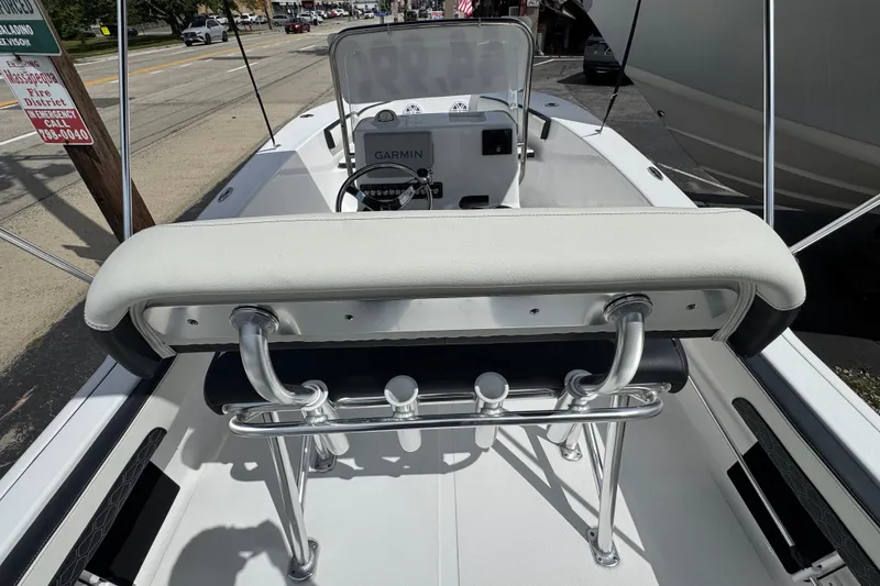 Slide: The Image of 2024 Tidewater 180 CC boat interior with Garmin navigation system and seating. - 6