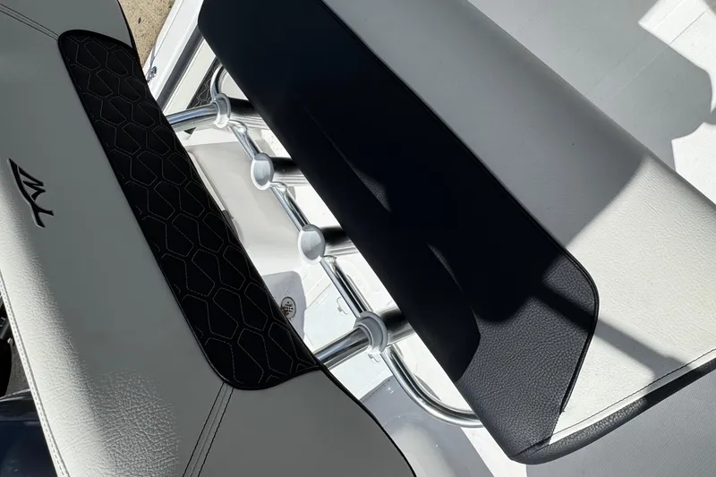 Slide: The Image of 2024 Tidewater 180 CC boat seat detail with sleek design and modern upholstery. - 9