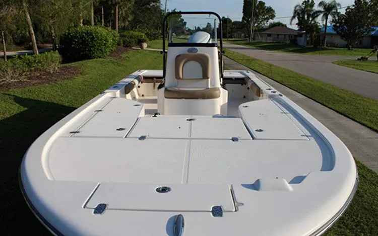 Slide: The Image of 2023 Sea Born FX22 Bay boat with spacious deck and seating. - 5