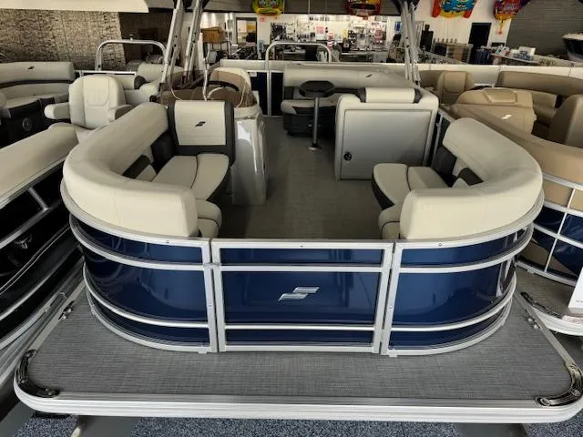 Slide: The Image of 2024 Starcraft EX 20 C pontoon boat with spacious seating and modern design. - 4