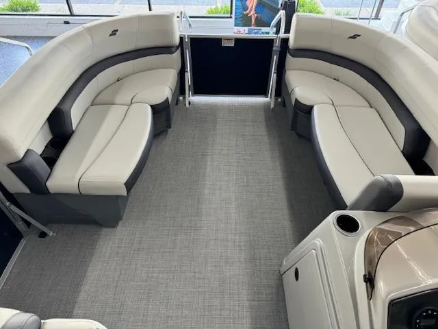 Slide: The Image of 2024 Starcraft EX 20 C pontoon boat interior with spacious seating and modern design. - 6