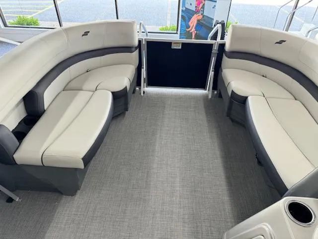 Slide: The Image of 2024 Starcraft EX 20 C pontoon boat interior with spacious seating. - 8