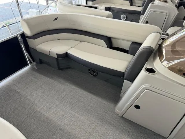 Slide: The Image of 2024 Starcraft EX 20 C boat interior with plush seating and modern design. - 9