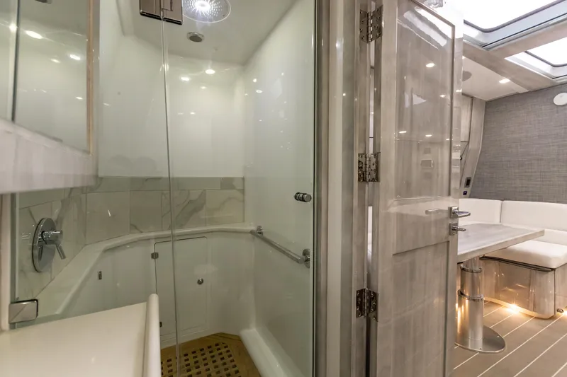 Slide: The Image of Luxurious bathroom and seating area in 2022 HCB 65 Estrella yacht. - 15