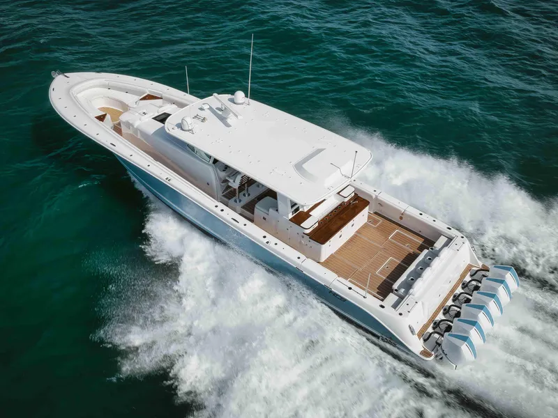Slide: The Image of 2022 HCB 65 Estrella luxury yacht cruising on open water. - 17