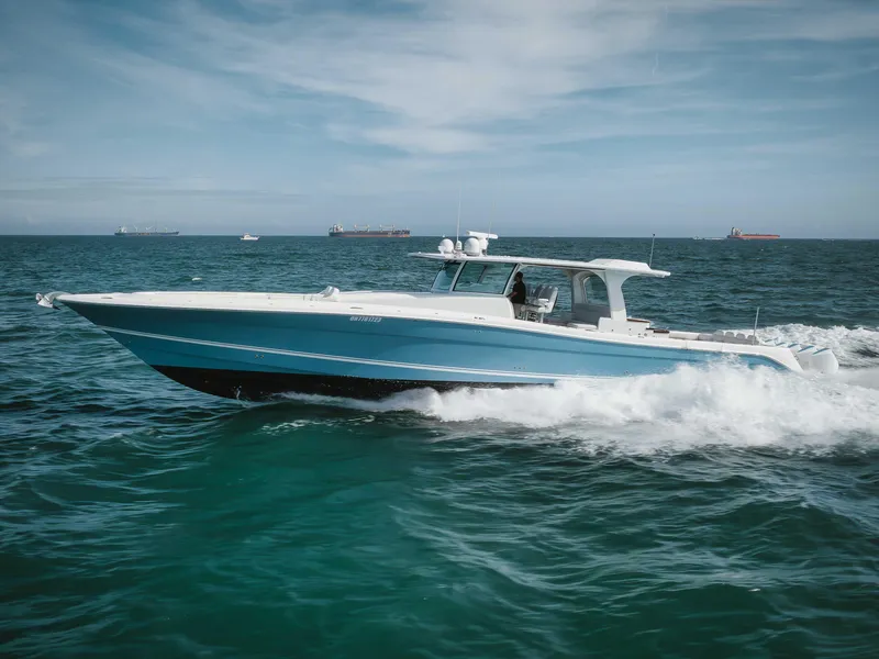 Slide: The Image of 2022 HCB 65 Estrella boat cruising on open water. - 23