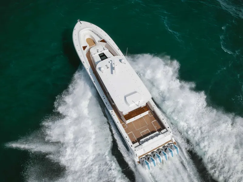 Slide: The Image of Aerial view of 2022 HCB 65 Estrella yacht cruising on the ocean. - 27