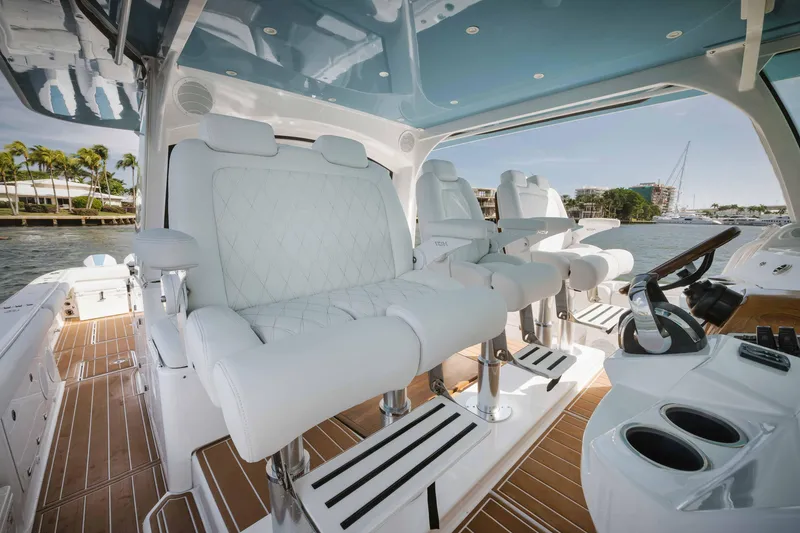 Slide: The Image of Luxurious seating on the 2022 HCB 65 Estrella yacht, featuring white leather and modern design. - 33