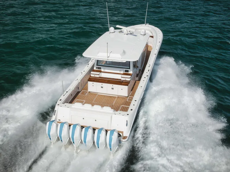 Slide: The Image of 2022 HCB 65 Estrella luxury yacht cruising on open water. - 4