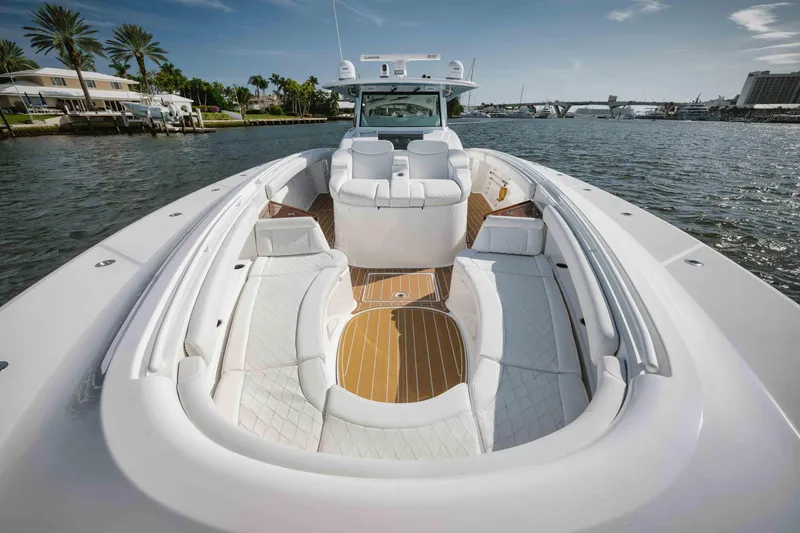 Slide: The Image of 2022 HCB 65 Estrella luxury yacht with spacious seating and elegant design on the water. - 46