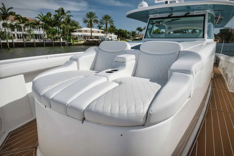 Slide: The Image of Luxurious seating on the 2022 HCB 65 Estrella yacht with waterfront view. - 47