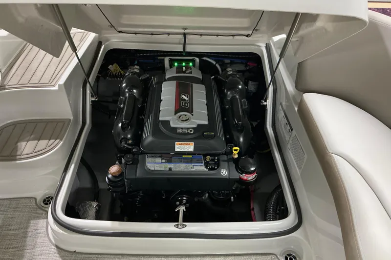 Slide: The Image of 2024 Crownline 280 SS boat engine compartment with 6.2L 350 horsepower engine. - 13