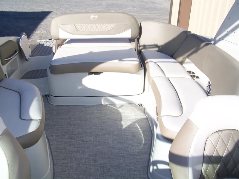 Slide: The Image of 2024 Crownline 280 boat interior with spacious seating and modern design. - 8