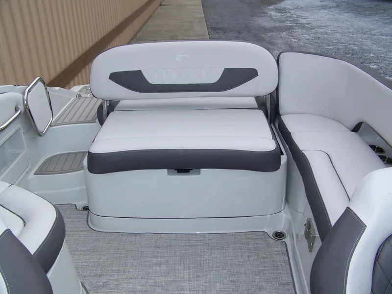 Slide: The Image of 2024 Crownline 260 boat interior with white and gray seating. - 10