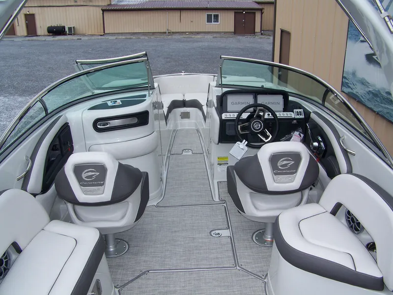 Slide: The Image of 2024 Crownline 260 boat interior with modern seating and dashboard. - 4