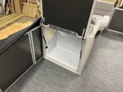 Slide: The Image of 2023 Sweetwater 2286SBX boat interior storage compartment. - 4