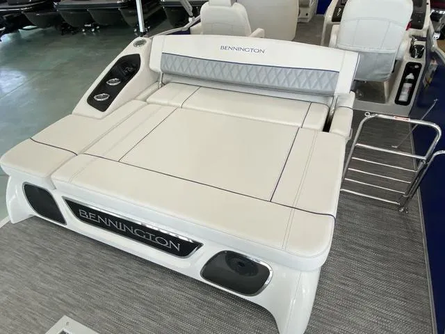 Slide: The Image of 2024 Bennington 23 RSB boat with luxurious white seating and modern design. - 11