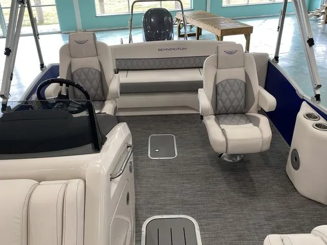 Slide: The Image of 2024 Bennington 23 RSB boat interior with luxurious seating and modern design. - 13